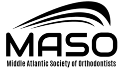 A smiling girl holds and points to an Invisalign Teen aligner with Carpinello Orthodontics in Drexel Hill, Newtown Square or Edgmont, PA, on a blue background. A smiling girl holds and points to an Invisalign Teen aligner with Carpinello Orthodontics in Drexel Hill, Newtown Square or Edgmont, PA, on a blue background.