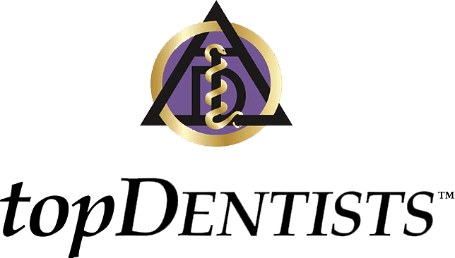 A smiling girl holds and points to an Invisalign Teen aligner with Carpinello Orthodontics in Drexel Hill, Newtown Square or Edgmont, PA, on a blue background. A smiling girl holds and points to an Invisalign Teen aligner with Carpinello Orthodontics in Drexel Hill, Newtown Square or Edgmont, PA, on a blue background.